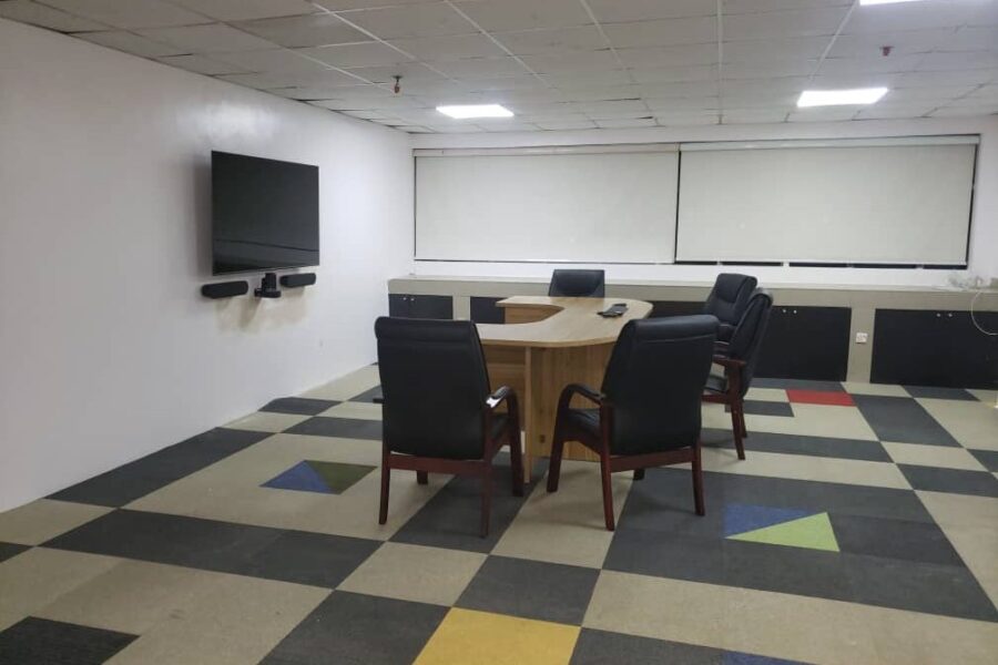 Meeting room with wall display and video bar