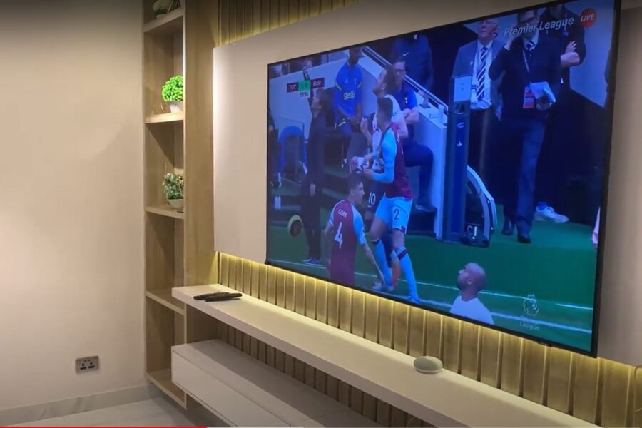 Apartment TV wall with accent lighting