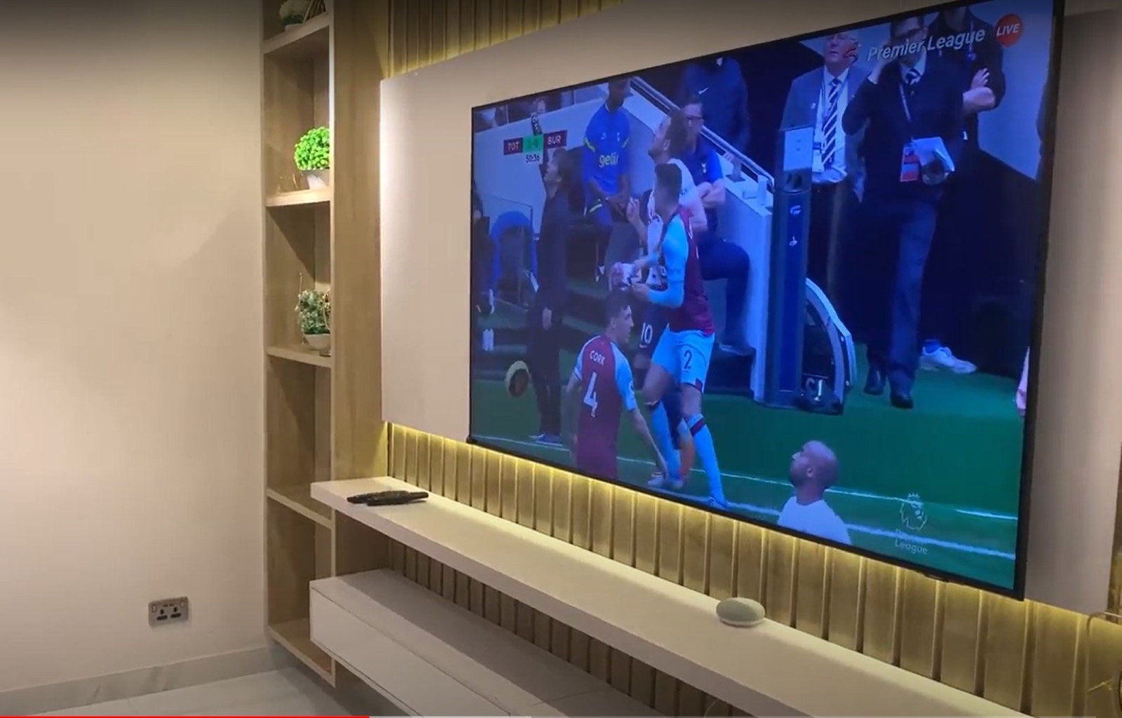 Apartment TV wall with accent lighting